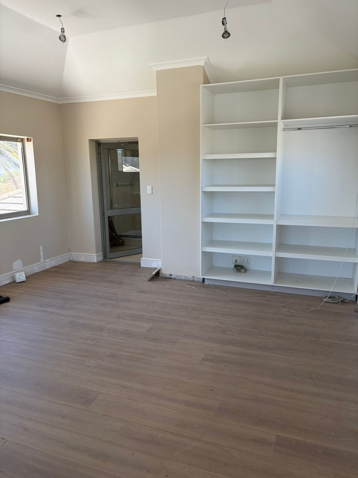 Finished room with built-in shelving